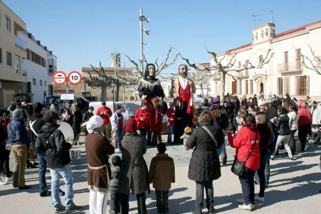 La cercavila que va donar pas a la celebració de la festa al Poal.