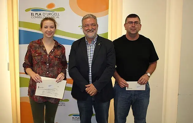 Júlia Garriga, amb el president Francesc Fabregat i el tutor Andreu Moix.