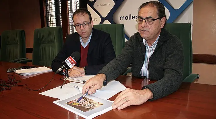 Marc Solsona i Josep Lavín mostren el projecte del Banc d&#39;Aliments a Mollerussa.