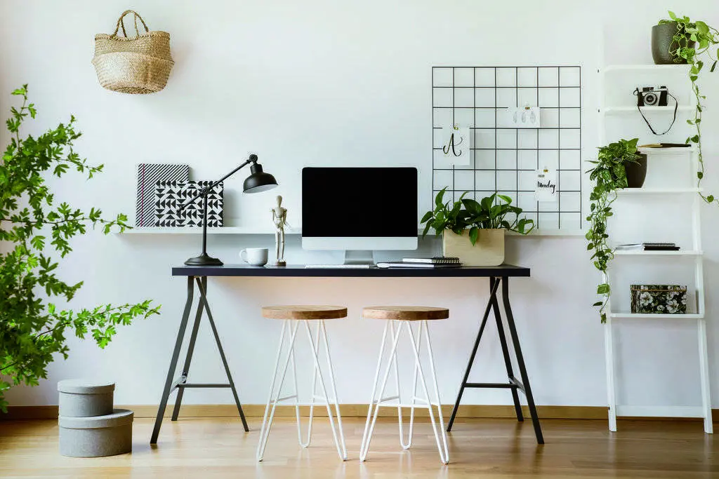 Desktop computer mock-up on an industrial desk in a scandinavian student bedroom interior workspace with white walls