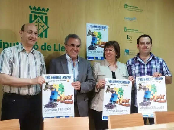 La vicepresidenta de la Diputació, Rosa MAria Perelló, amb l'alcalde Enric Mir i els representants de l'entitat organitzadora Xavier Roig i Josep Bernaus