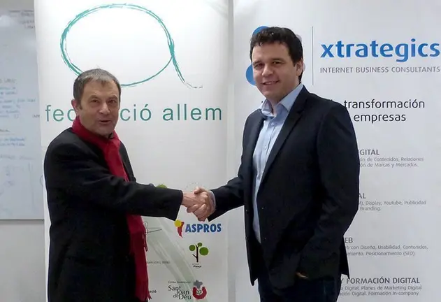 Representants de ALLEM i Xtrategics en l'acte de lliurament