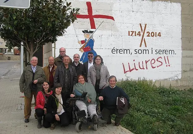 Els representants de l'Ateneu Golmesenc davan d'una de les seves iniciatives.