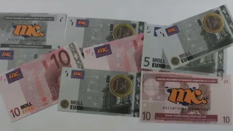 Imatge dels bitllets de 1, 5 i 10 Molleuros que distribuirà Mollerussa Comercial.