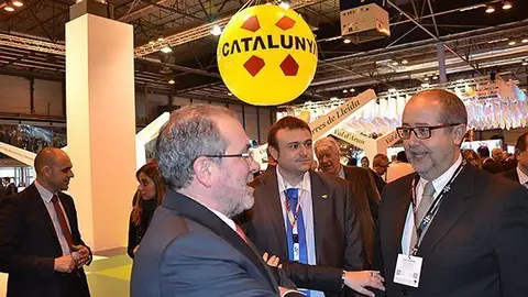 Joan Reñé amb conseller Puig a la fira de turisme FITUR de Madrid.