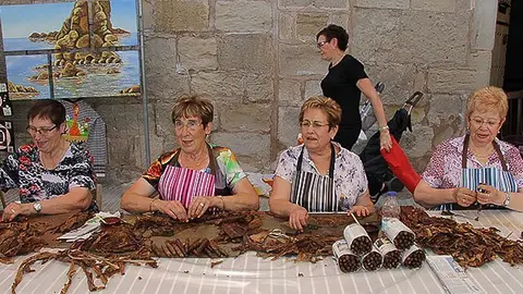 Les caragoladores de caliquenyos en la Mostra d'Oficis Antics de Fondarella.