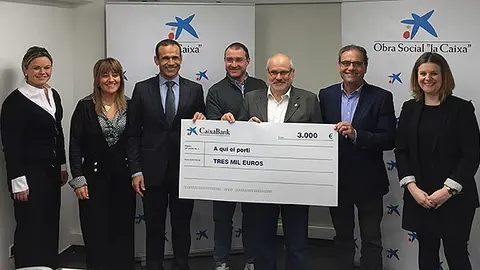 Acte de lliurament dels talons de La Caixa Portada