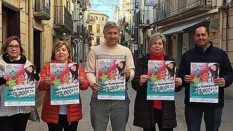 Els representants de l'Agrupació de Comerciants de les Borges i el regidor de Promoció Econòmica presentant la campanya de Nadal 2017 portada