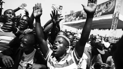 22 January 2018. Monrovia: Crowds of people celebrate after the Liberia Presidential Inauguration at the Samuel Canyon Doe Sports Complex in Monrovia, Liberia. 
Former football player, George Manneh Weah, took the oath of office as the 24th President of the Republic of Liberia at the main stadium outside Monrovia. The oath was administered by the Chief Justice of the Supreme Court of Liberia, Francis Korkpor , marking the first peaceful transfer of power in 73 years from one elected President to another.
Weah of the main opposition Coalition for Democratic Change (CDC) won the presidential runoff election in December 26, against outgoing Vice President Joseph Boakai of the former ruling Unity Party (UP).
Photo by Albert Gonzalez Farran - UNMIL