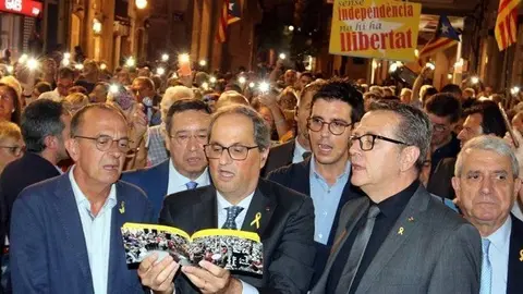 El president Quim Torra, acompanyat de Miquel Pueyo, i Joan Talarn