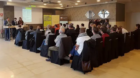 Productors i consumidors en les reunions en la jornada a Masia Les Garrigues