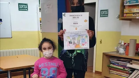 Els infants han elaborat postals per la seva comunitat