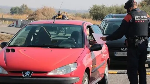 Mossos d'Esquadra durant un control a l'antiga N-II, Alcarràs @Mossos
