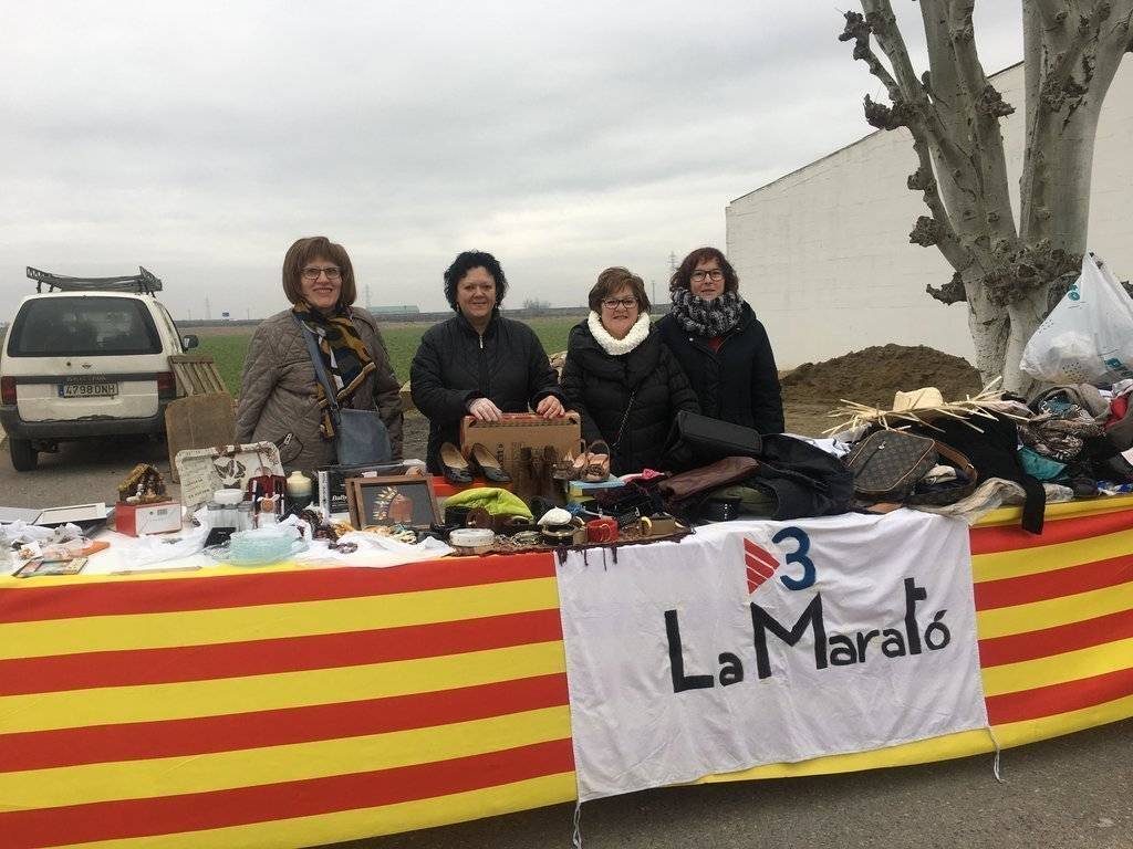 Associació de dones xocolata i coca i parada d'articles de segona mà Fondarella per la Marató 2018