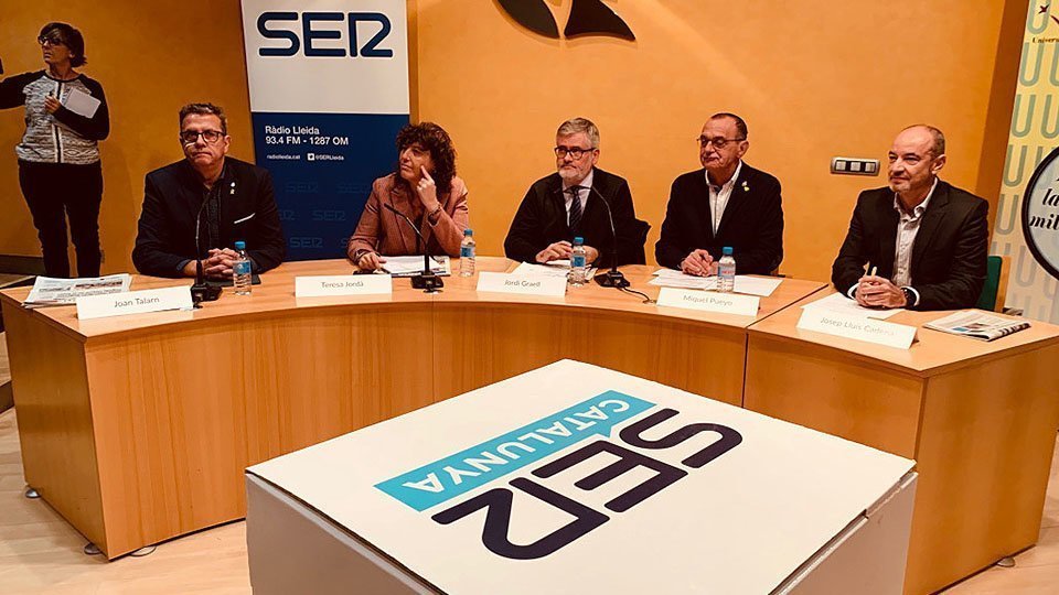 La consellera d'Agricultura  Teresa Jordà, Joan Talarn i Miquel Pueyo